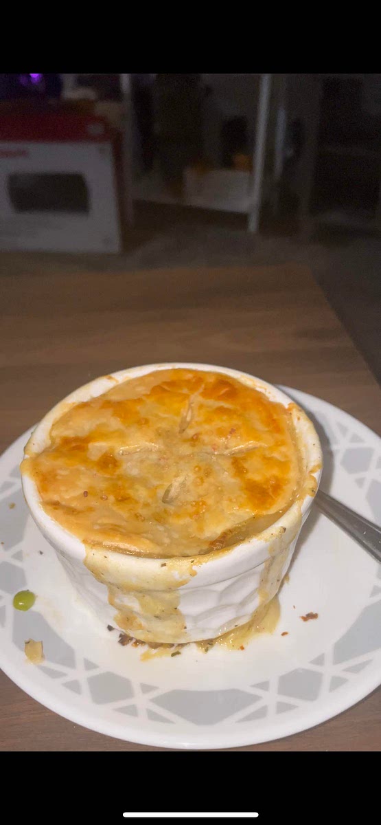 Add egg wash to the top of the chicken pot pie and salt flakes as well. Then bake for about 15 minutes or until golden brown on top. Filling may spill out if filled too high or puff pastry is not seal onto the ramekin.