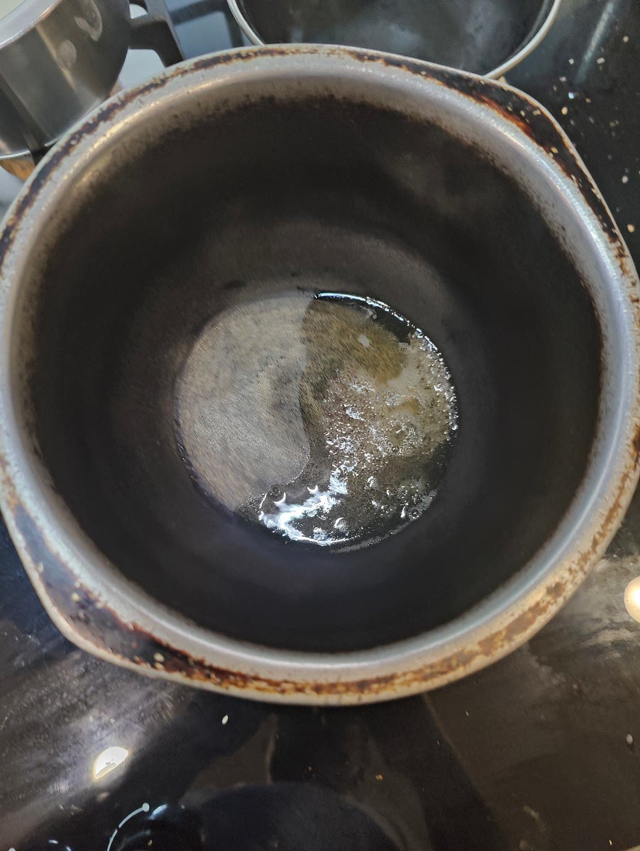 Take a heavy Bottomed utensil and heat some nalla yennai.