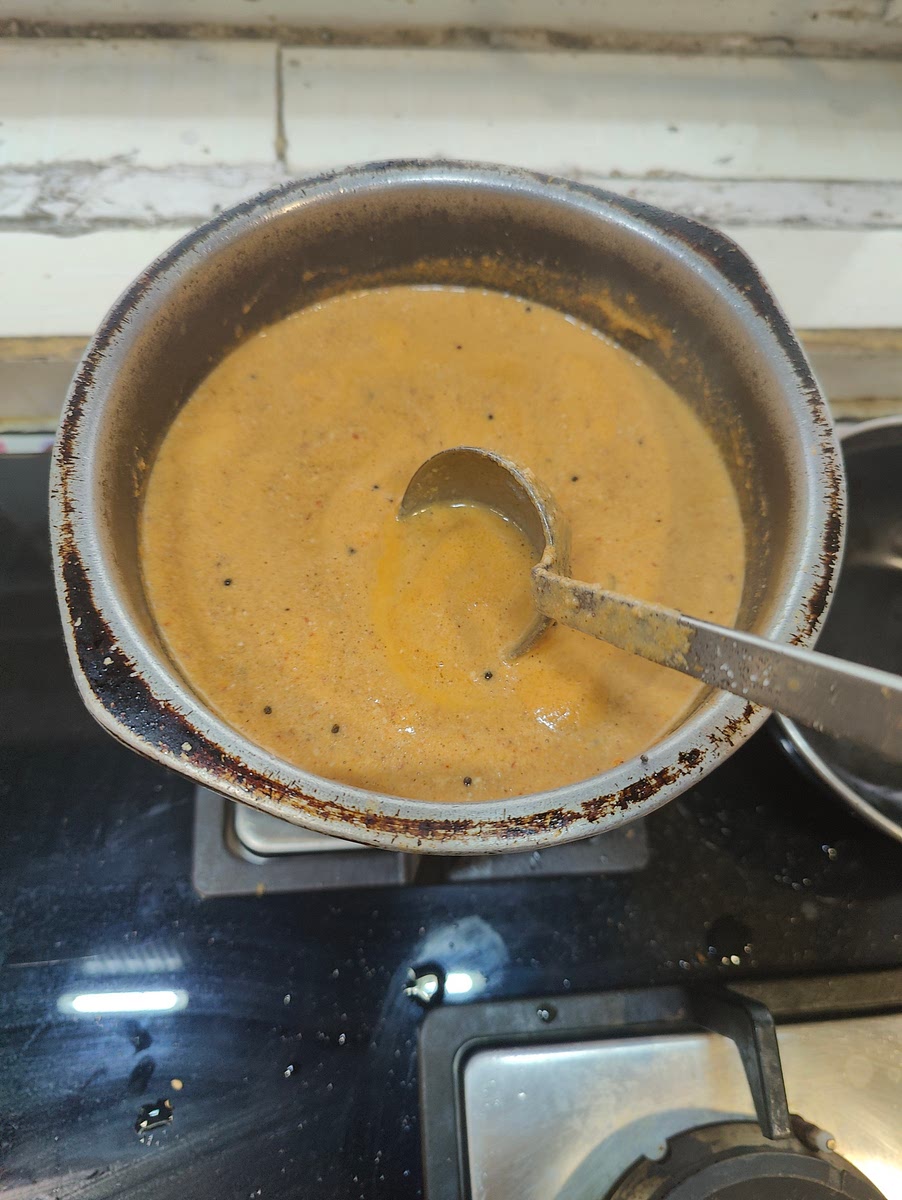 Keep mixing and removing the froth from the top and keep boiling it slowly till its done.