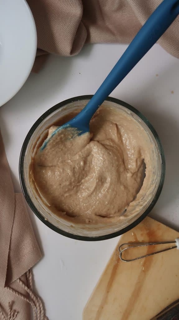 Gather and measure all ingredients by starting to mix oat flour, baking powder and cinnamon in a bowl. Therefore, add-in applesauce, vanilla extract, honey or maple syrup, milk of choice and stir until well combined. Leave this aside and consequetly start making the apple filling.