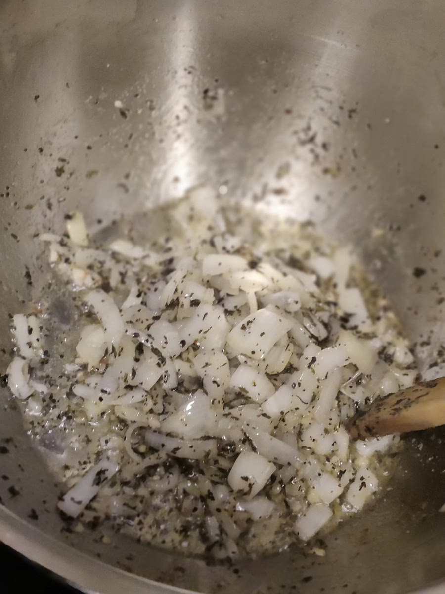 Add Oils to pot
Sauté onions, garlic, oregano until soft.