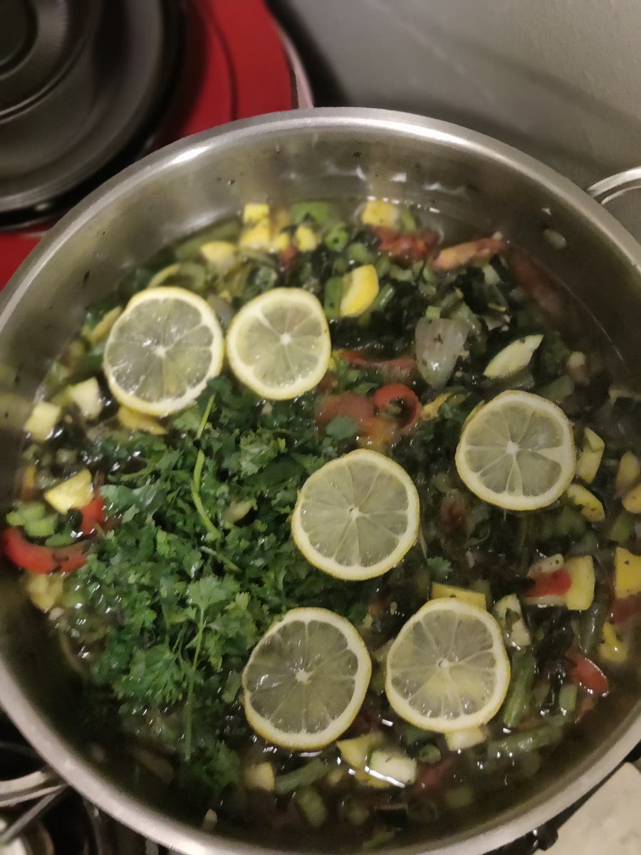 Add green beans, spinach zucchini,squash celery, salt, dill, onion powder, lemon slices, basil, and lemon juice.