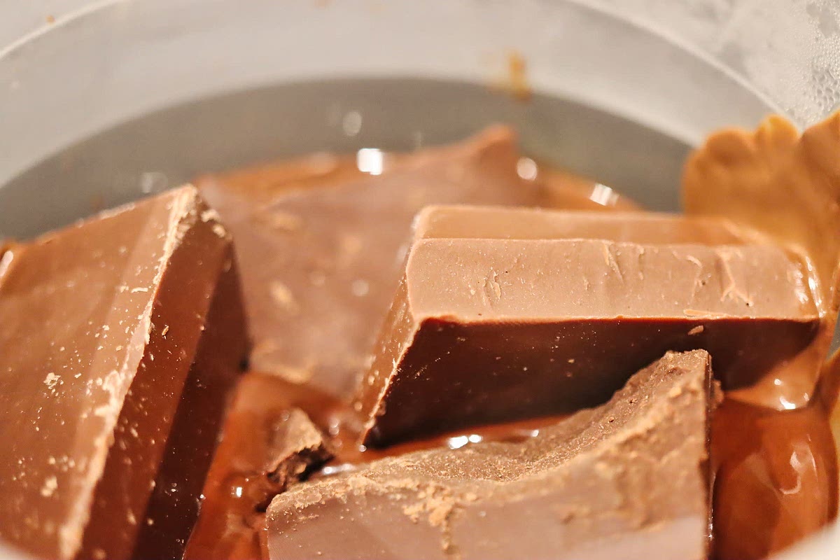 Melt the chocolate in a double boiler.