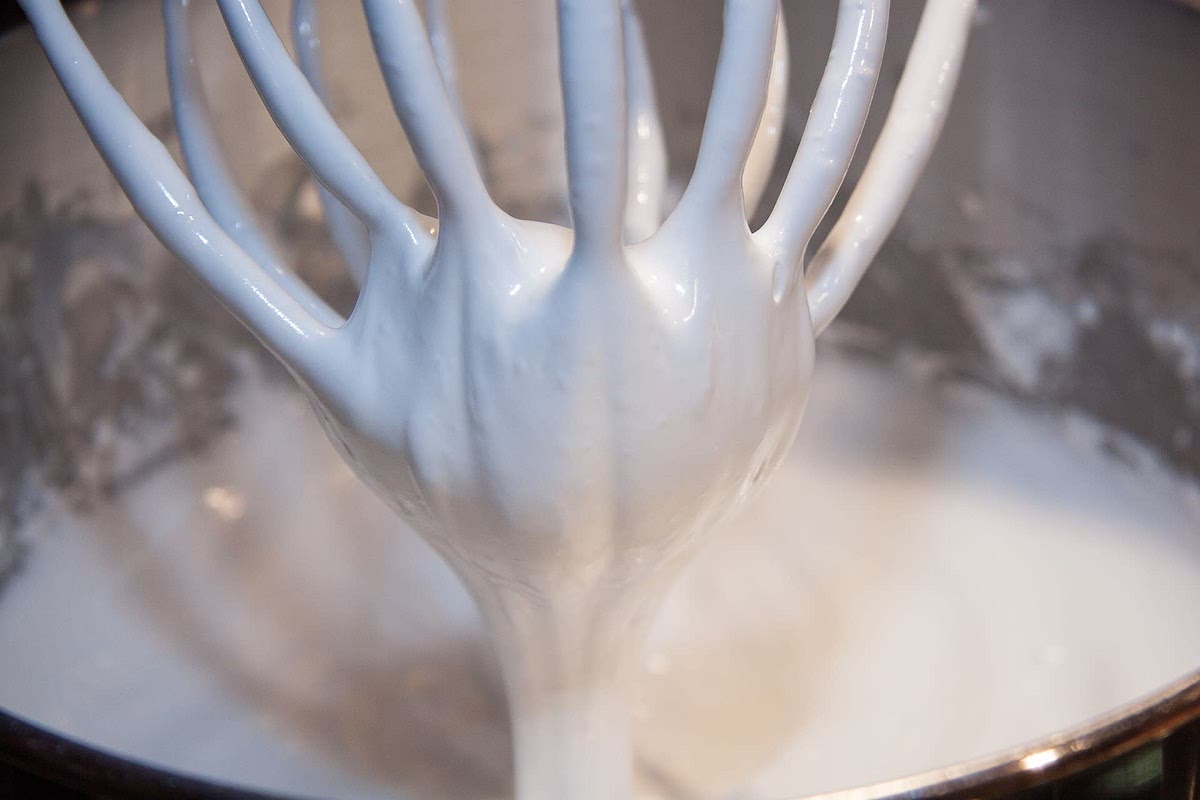 Beat the egg whites until stiff.