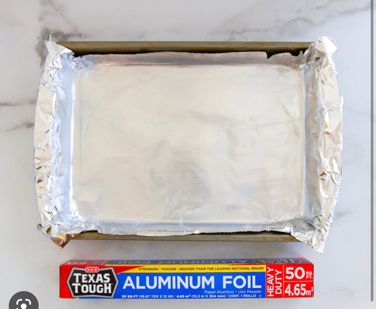 Set oven to 450 and line a baking dish with tinfoil add all chopped vegetables on pan. Then d