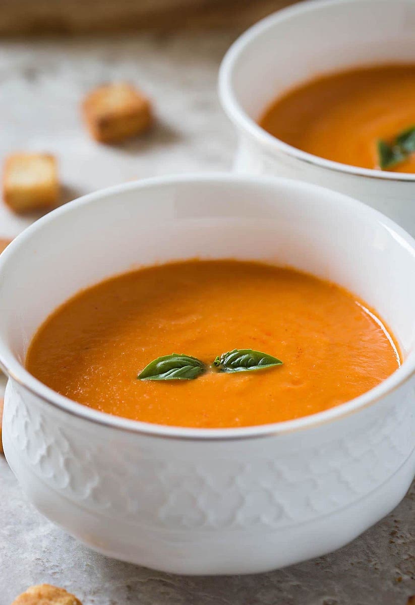 Add 2 cups or chicken broth and 2 cups heaving whipping cream. Salt and pepper to taste and reheat soup but do not boil. Once portioned drizzle chili oil on top for an extra kick