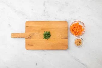 Pop the carrot ribbons into a small bowl with the rice vinegar, sugar for pickling (see pantry for amount) and half the sambal. Add a pinch of salt, mix together, then set aside.