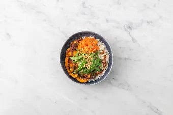Serve with your carrot pickle on top and finish with a scattering of the peanuts and remaining coriander.