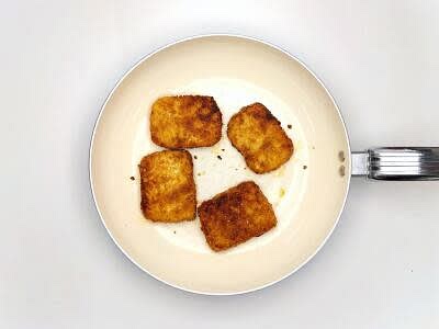 Heat a large, wide-based pan (preferably non-stick) with a very generous drizzle of vegetable oil (enough to cover the base of the pan) over a medium-high heat Once hot, add the breaded tofu and cook for 4-5 min on each side or until browned – this is your tofu schnitzel