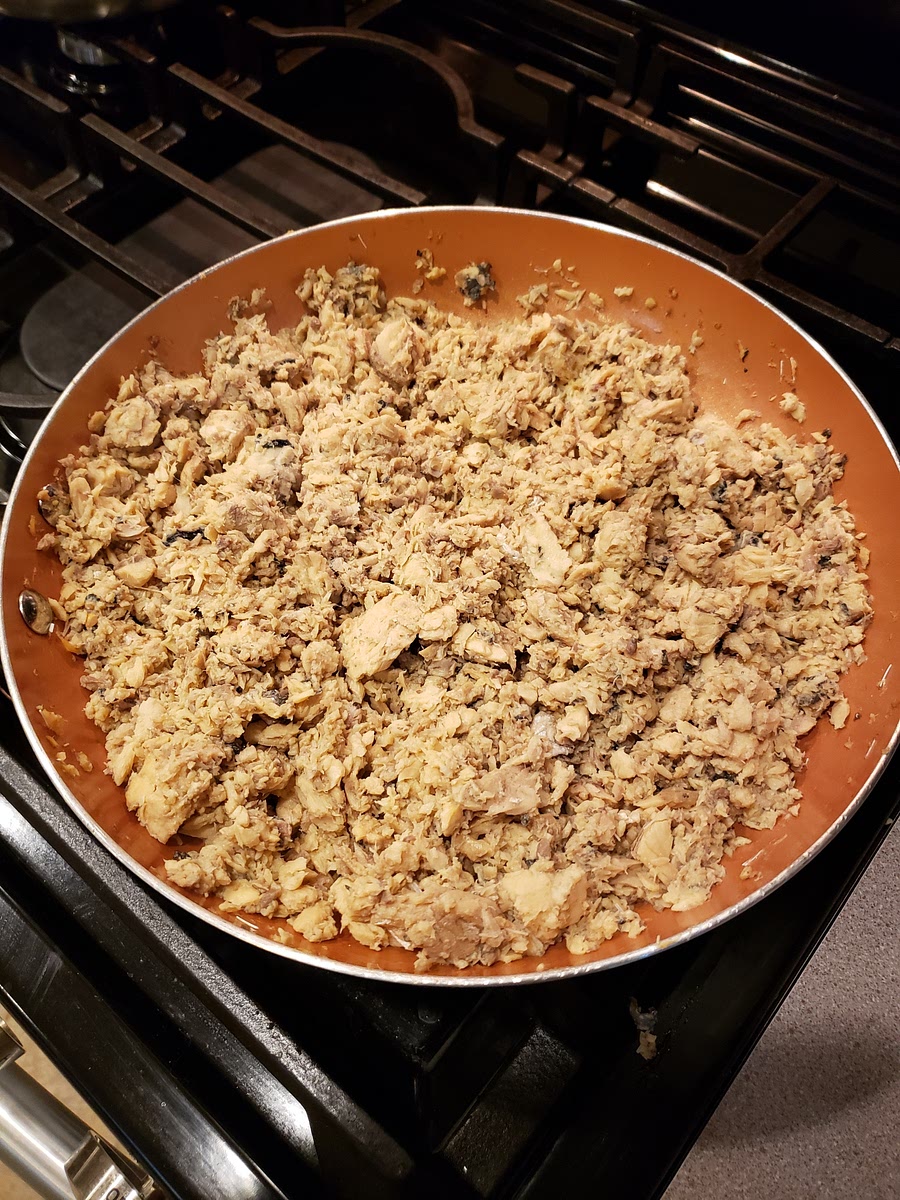 Cook the salmon on medium low heat until it is mostly dry.