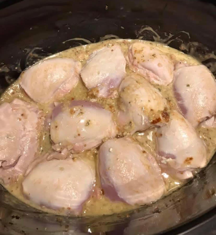 Pop the chicken thighs on top of the mixture and cook on low for 5 hours.