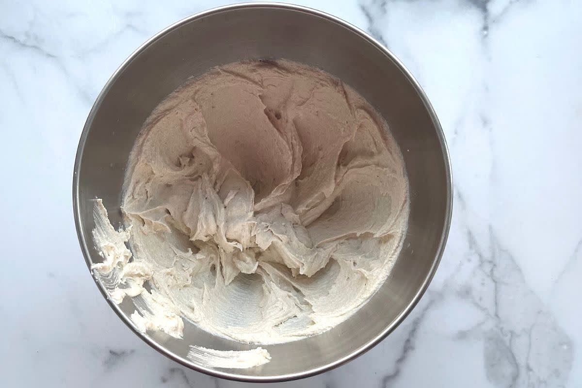 Step 4: In a large mixing bowl, whisk the room-temperature butter, white sugar, and brown sugar until smooth. Next, whisk in the flaxseed paste and vanilla extract.