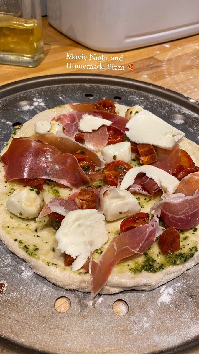 When you are ready to create a pizza, remove from the fridge and use your hands to pull the pizza dough into a base. Sprinkle some semolina and flour onto a pizza tray and place the base on top. Decorate with your favourite toppings and then bake in a preheated oven at 220 degrees celsius for 8-10 minutes.