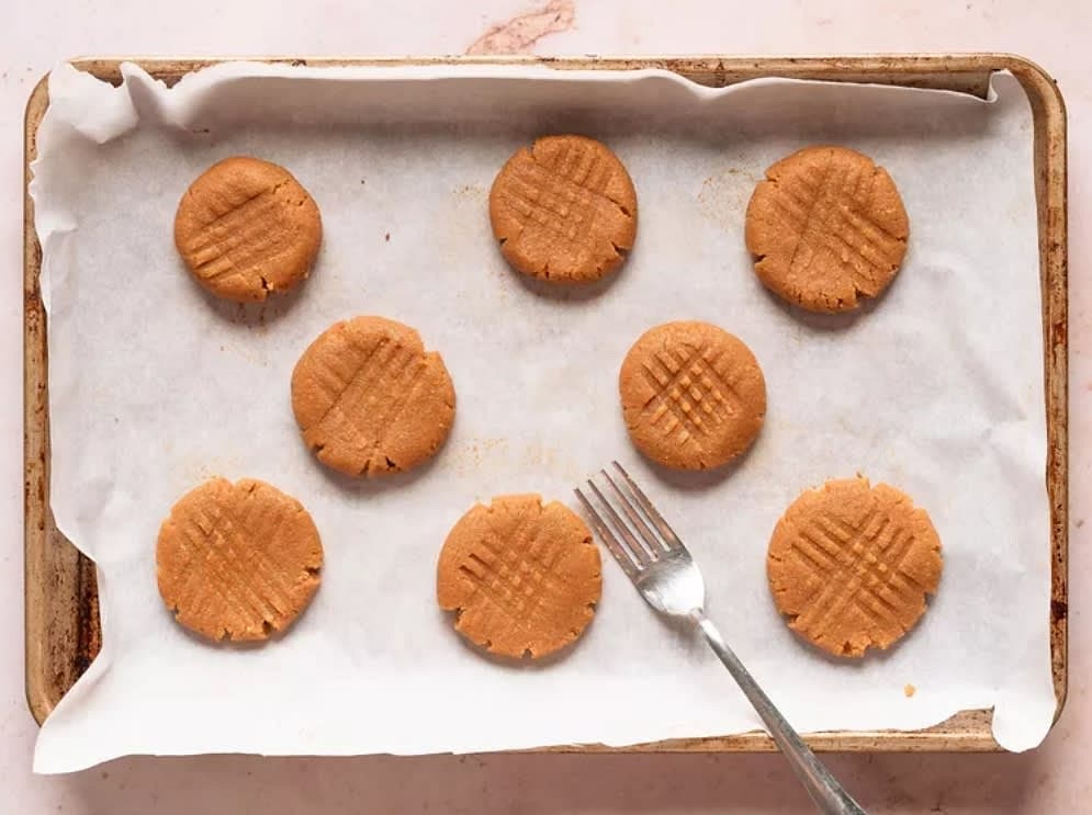 Flatten each cookie with a fork to make a criss-cross