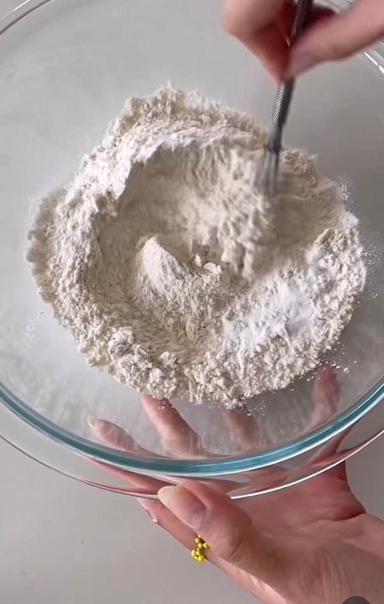 Combine flour, baking powder, baking soda, sugar, and salt in another bowl.
