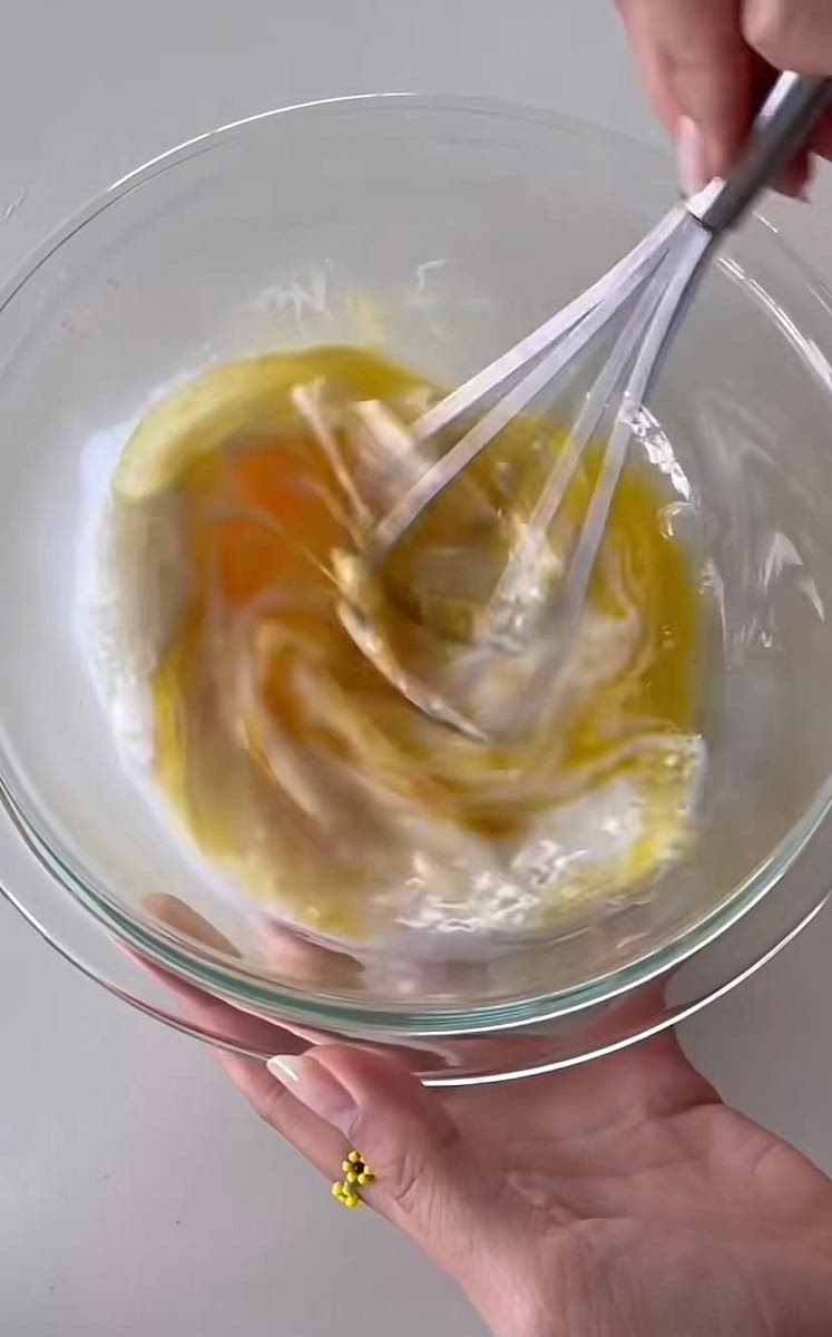 Combine buttermilk, egg, oil, butter, and vanilla in one bowl and whisk.