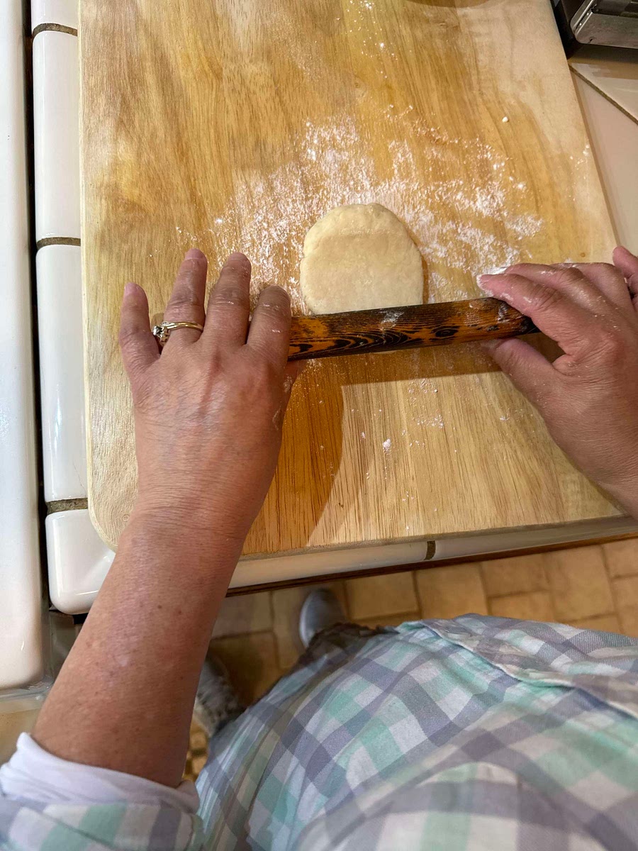 Add Flour to your rolling pin and cutting board before rolling out the dough