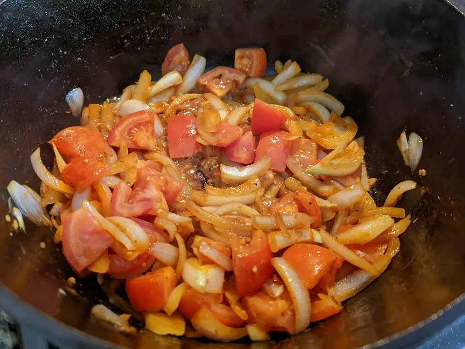 Add the tomatoes and simmer for 5 minutes.