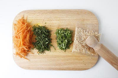Meanwhile, top, tail, peel and grate the carrot[s]. Strip the mint leaves from their stems and chop them finely, discard the stems Chop the coriander finely, including the stalks. Bash the peanuts with a rolling pin (keep them in the bag so you don't lose any!)