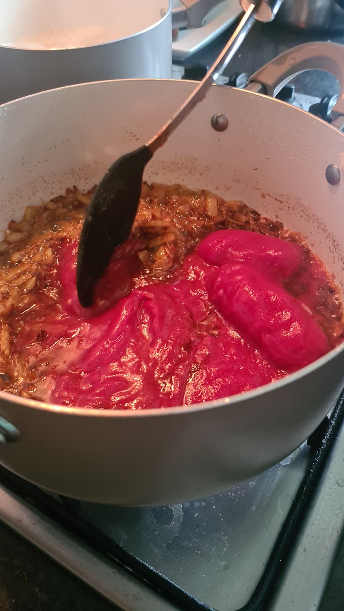 Then add the tomato can
