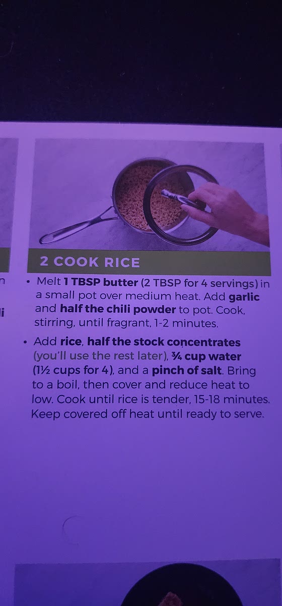 Melt 2 tablespoons of butter in a small pot over medium heat. Add garlic and chili powder to pot. Cook and stir for 1-2 minutes.