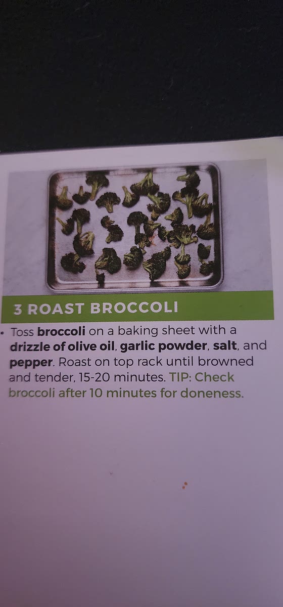 Toss broccoli on baking sheet with drizzle of oil, garlic powder, salt, and pepper. Roast on top rack for 15-20 minutes at 425 degrees. Chexk broccoli after 10 min