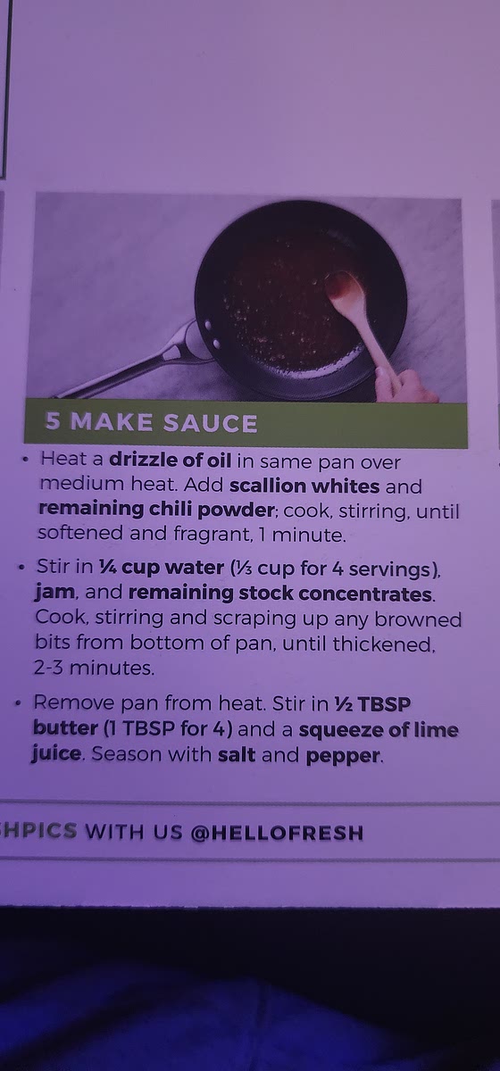 Remove pork chops and heat a drizzle of oil in the same pork over medium heat. Add scalian's and chili pepper cook stirring until softened in fragrant 1 minute. Stir in water jam and chicken stock concentrates cook stirring and scraping up any Brown bits from the bottom until thickened 2 to 3 minutes. Remove Pan from heat Stir and butter and squeeze of Lon juice season with salt and pepper. Add pork chops back.