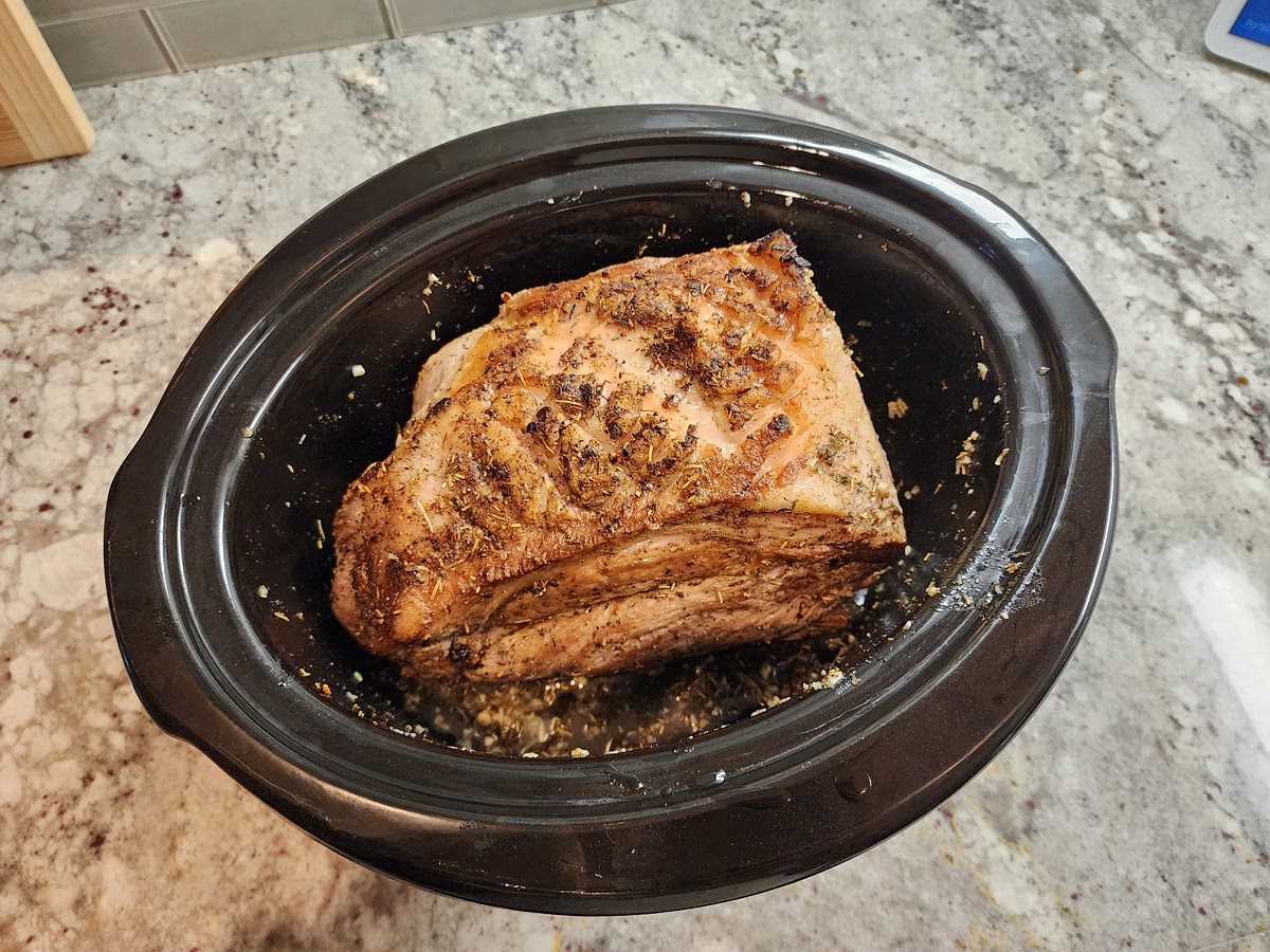 Place a large skillet on high heat, add 2 tbsp of avocado oil. When the oil starts to smoke, place the pork butt skin side down and sear until brown, about 5 min. Repeat on all sides of the pork butt. When finish, place the pork in the slow cooker bowl.