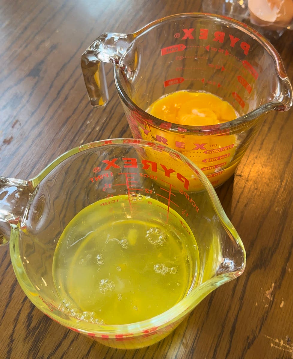 Take out the eggs from the fridge. Separate the whites and yolks into separate bowls while eggs are cold. Cover and set aside and allow it to come to room temperature.