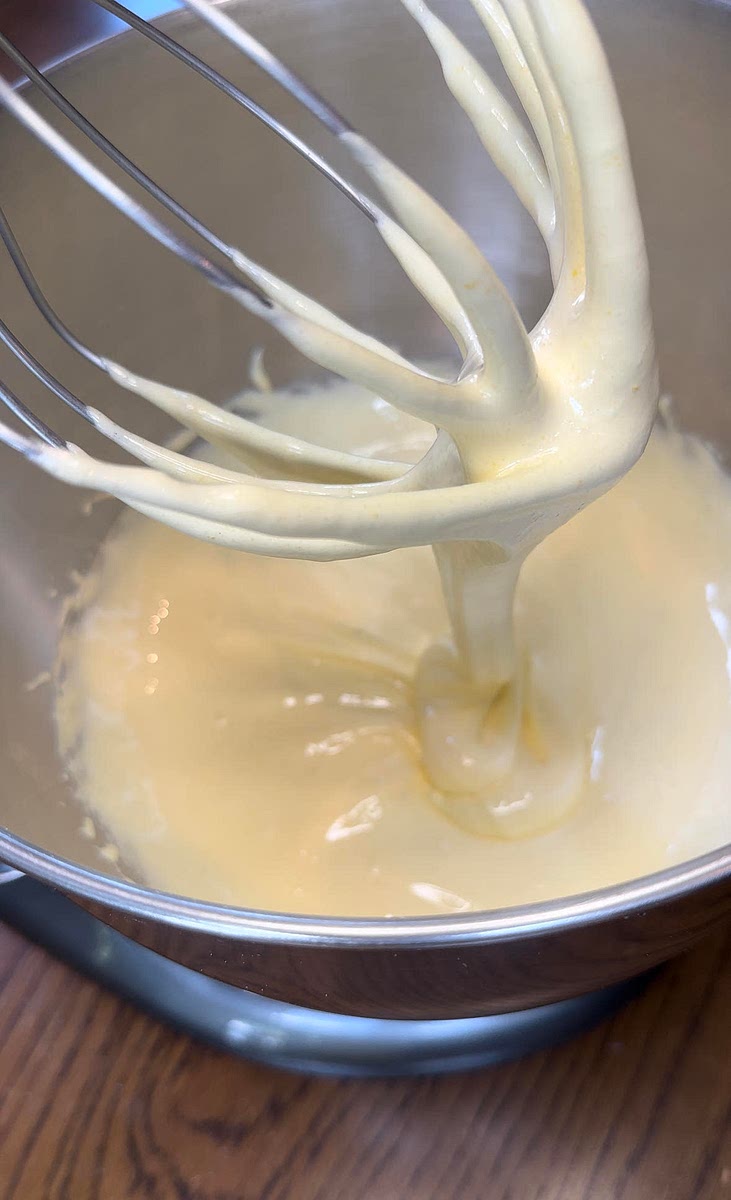 Beat the egg yolks with the fine granulated sugar that we set aside. Beat until very pale yellow in color and ribbon-like streaks are created when lifted. Set aside.