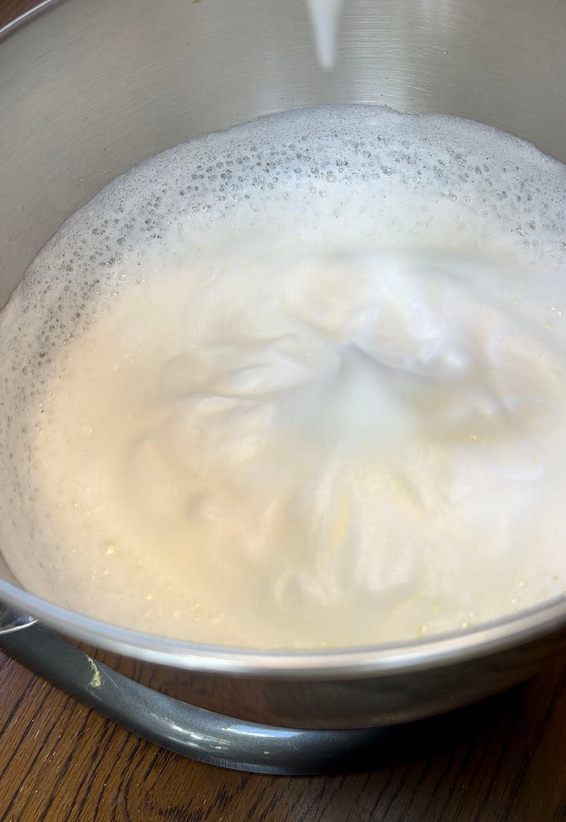 In a stand mixer (or hand mixer) with whisk attachment, beat the egg whites till foamy (make sure the bowl is sterile and completely clean so that the egg whites foam). Add creme of tartar. Continue beating till stiff peaks form (don’t over-beat).