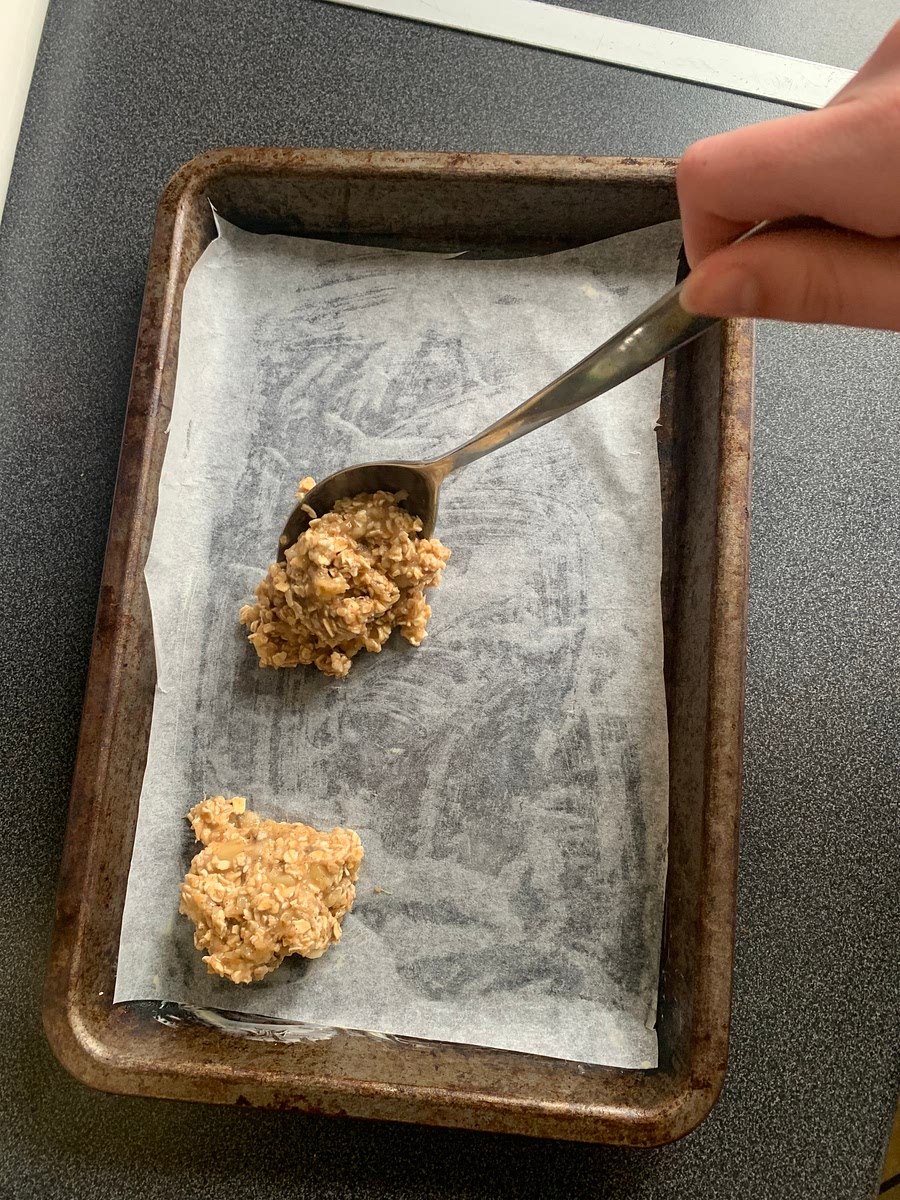 Grease/ or line a tray and shape the batter into 8 cookies