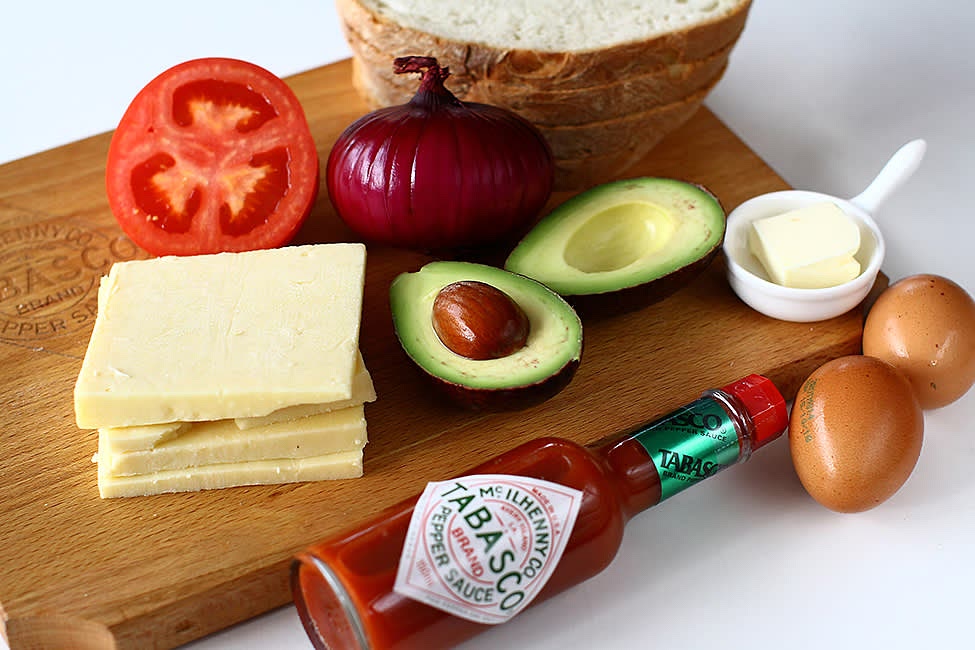 To make it go really fast, prepare all the ingredients ahead of time, have them at hand. Make sure you have a toaster and two pans that can hold two slices of the prepared bread, one of them with a lid.