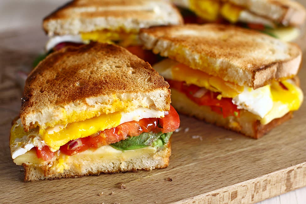 Finally, put the toasted bread in the toaster, buttered with TABASCO® red pepper sauce and serve immediately, while the eggs and bread are warm and the cheese is still nice and soft. I cut the sandwiches diagonally, right through the middle of the yolk, allowing it to ooze over the other tasty layers, whetting the appetite even more. I don't even have words to describe how good it is!