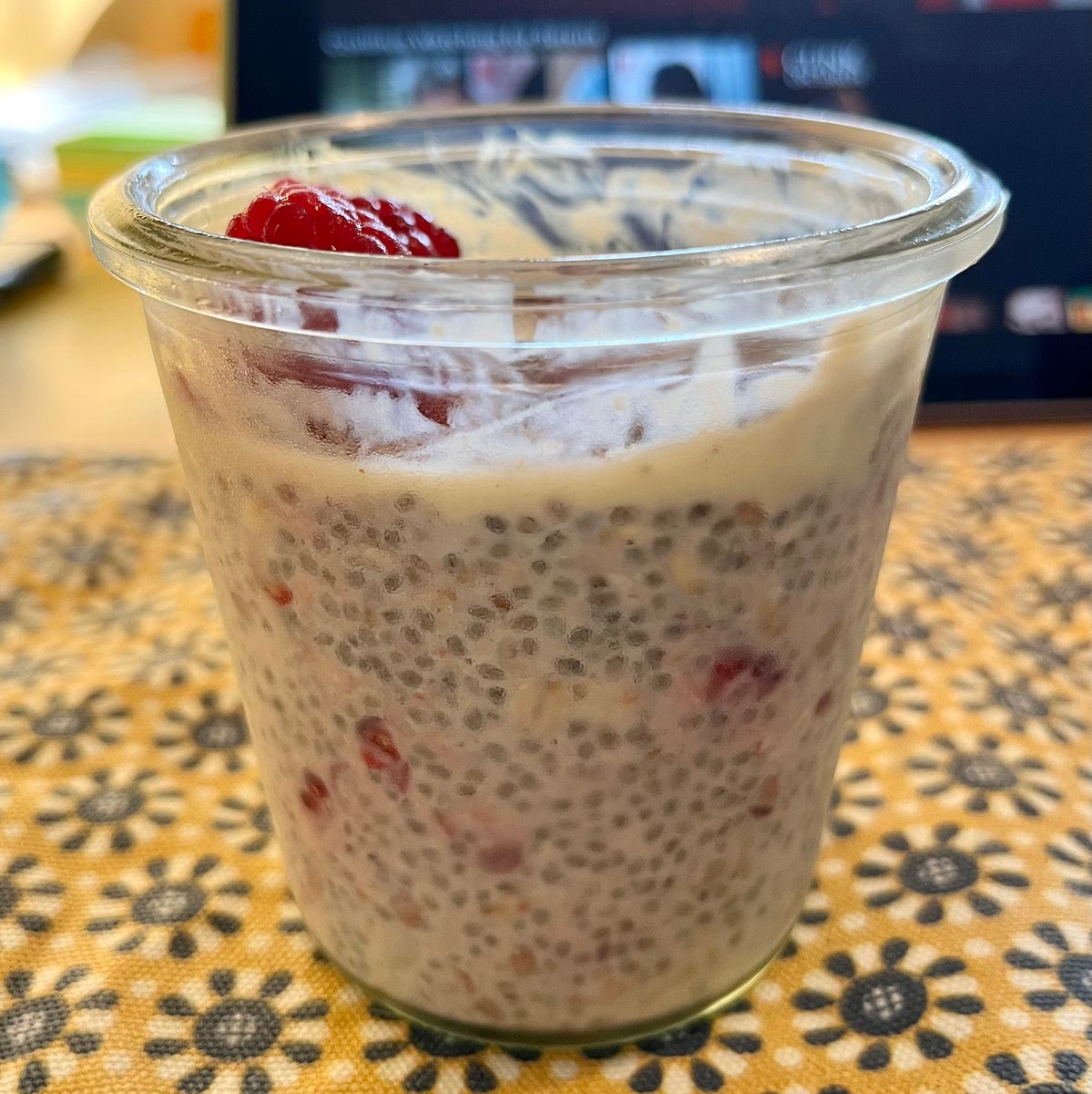 Lid your mason jar, or cover your serving cup with plastic wrap and chill in the fridge for a few hours or overnight. Top with extra raspberries if you want, and enjoy your delicious breakfast/snack.