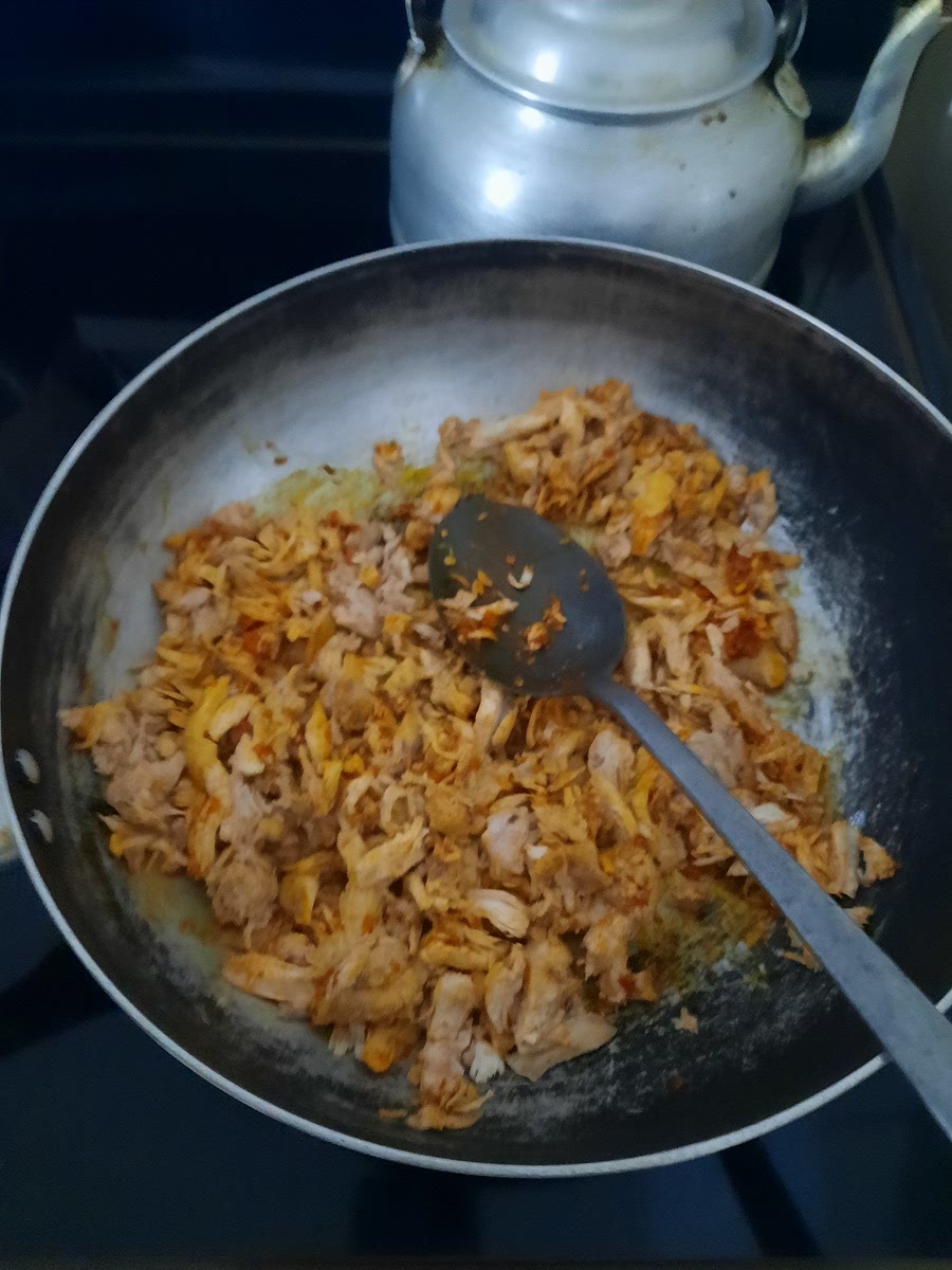 Agregar el pollo y mezclar