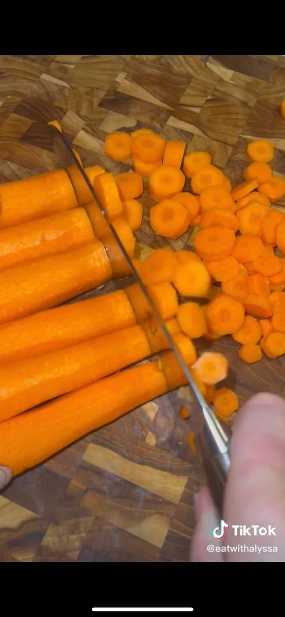 Add onion, chopped celery, sliced carrots, red potatoes, minced garlic, chicken bullion to taste, and chicken that has been de-boned and shredded
