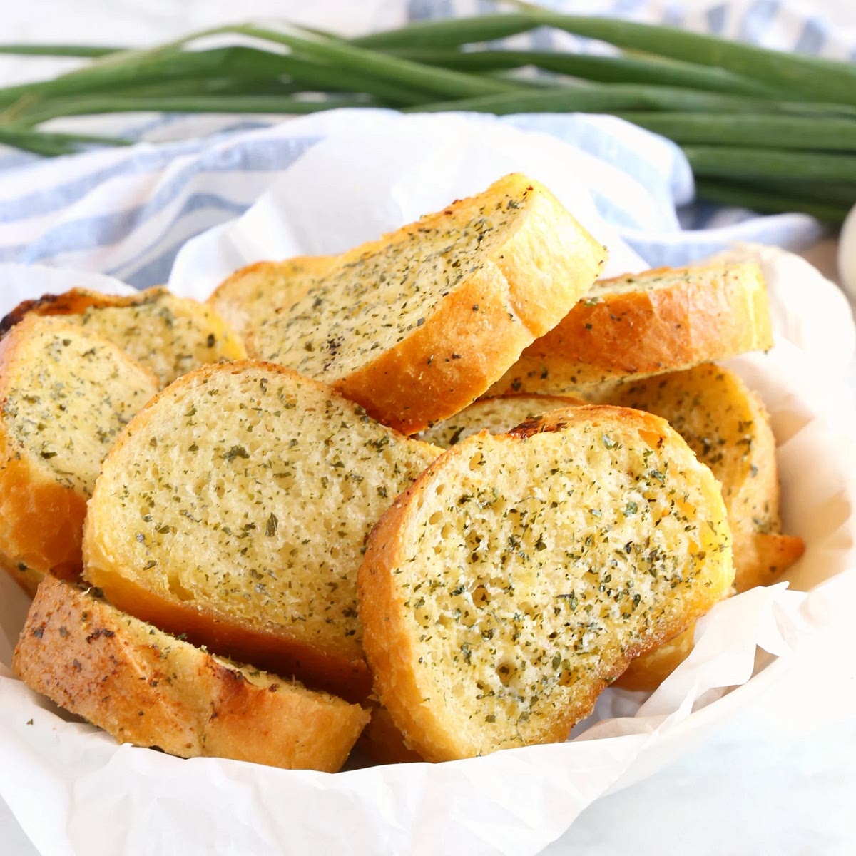Preheat oven to start cooking garlic bread