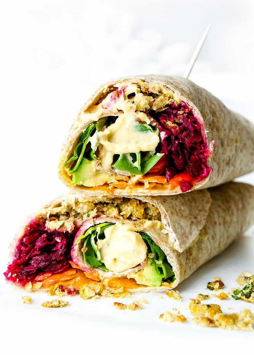 Next, carefully and tightly roll up the wrap, tucking in the ends and securing it with two toothpicks to prevent the contents from falling out.