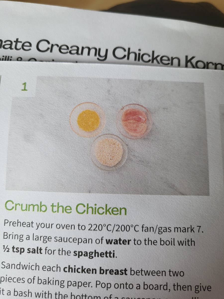 Oven to 200. Bring large saucepan of water to boil with pinch of salt. Bash chicken to 1-2cm thick. Crack egg in bowl and whisk. Breadcrumbs on plate with season. Crumb the chicken.