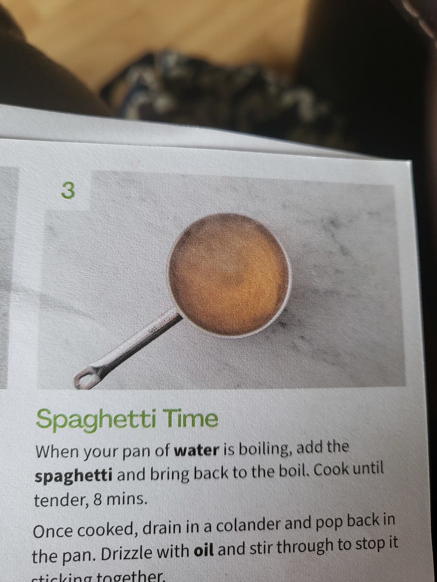 When water is boiling add spaghetti. Peel the garlic