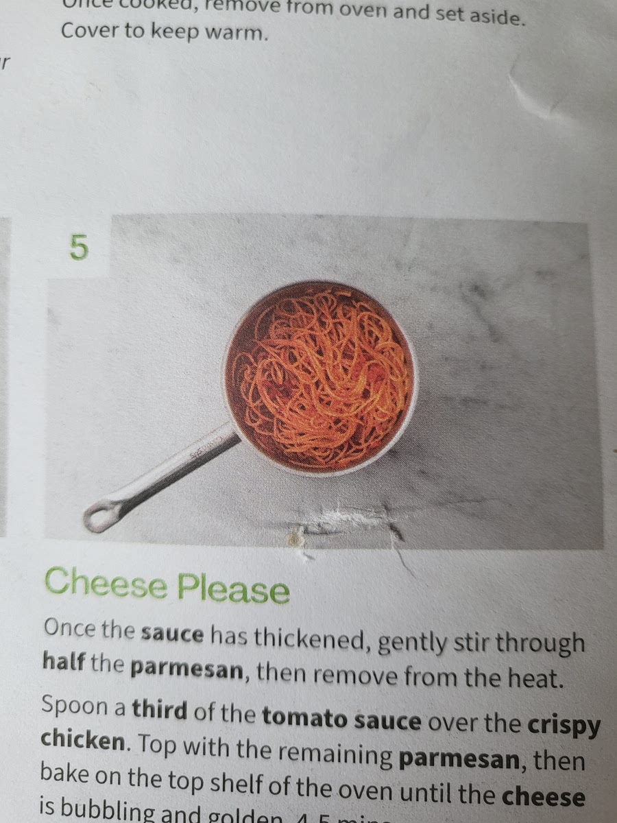 Once sauce has thickened, stir half the parmesan and remove from heat. Spoon third of the tomato sauce over the crispy chicken. Top with remaining parmesan. Bake in oven until cheese is bubbling. Add spaghetti to the remaining tomato sauce adding water if too thick. Slice chicken and serve ontop of spaghetti.