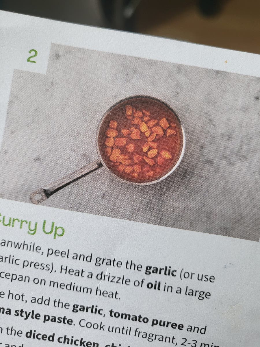 Peel garlic. Add oil to large saucepan. When hot, add garlic, tomato puree and korma style paste. Cook 2-3mins. Stir in diced chicken, chicken stock paste, sugar and water for curry. Bring to boil, turn heat down and cover with lid. Simmer till chicken is cooked and sauce has thickened (12-15mins)