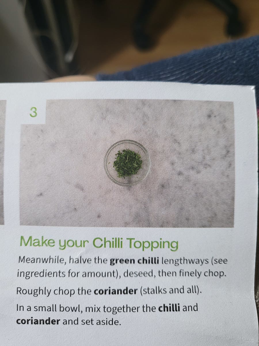 Halve the fgreen chili, deseed and finely chop. Roughly chop coriander. Mix together.
