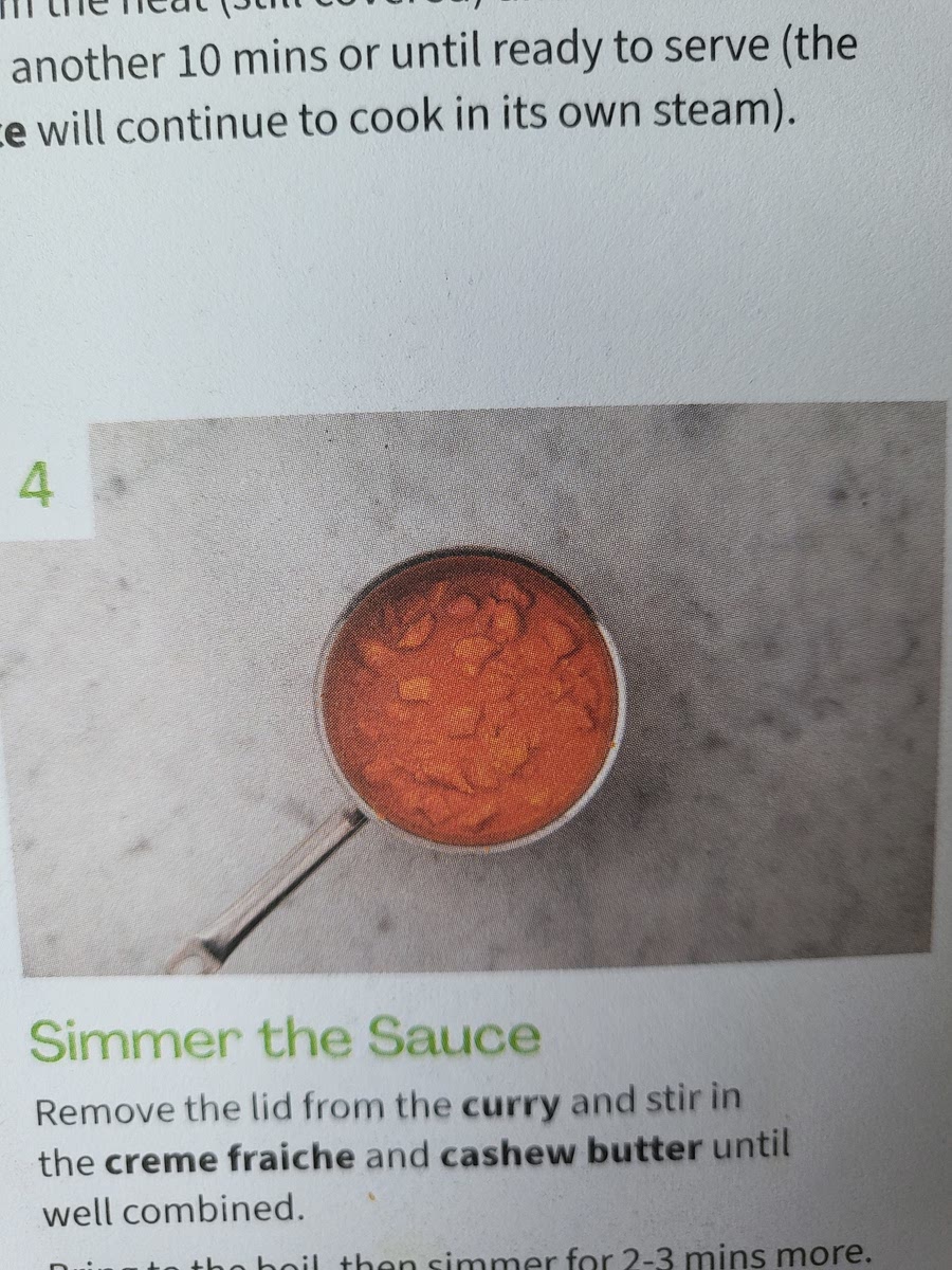 Remove the lid from the curry and stir in creme fraiche and cashew butter. Bring to boil and simmer 2-3mins.