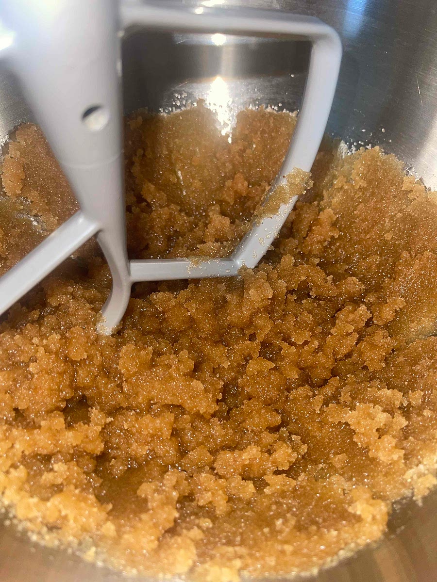 Mix melted butter and both sugars.