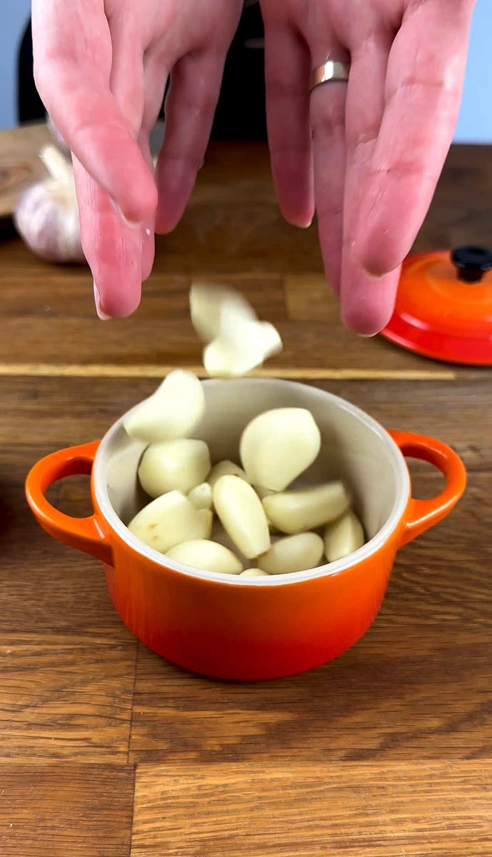 * Peel the garlic cloves and place them in a small baking dish.