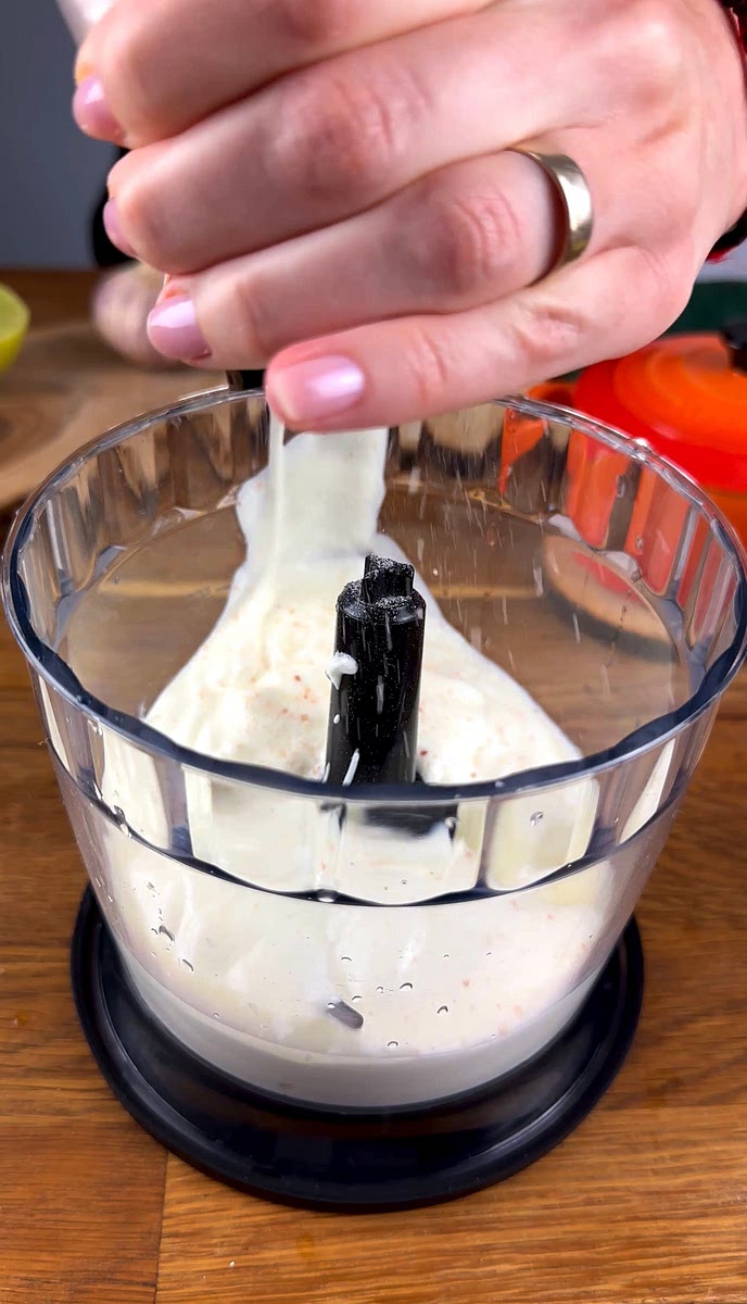 * Add yogurt, lime juice, salt, and pepper to the food processor. Blitz until the mixture is smooth. Taste for seasoning and adjust according to your preference.