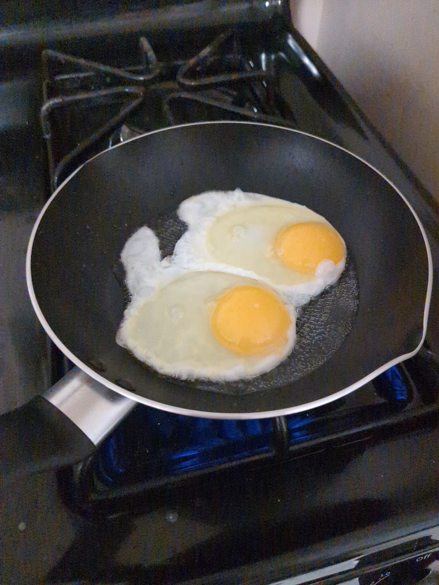 Fry eggs over easy
