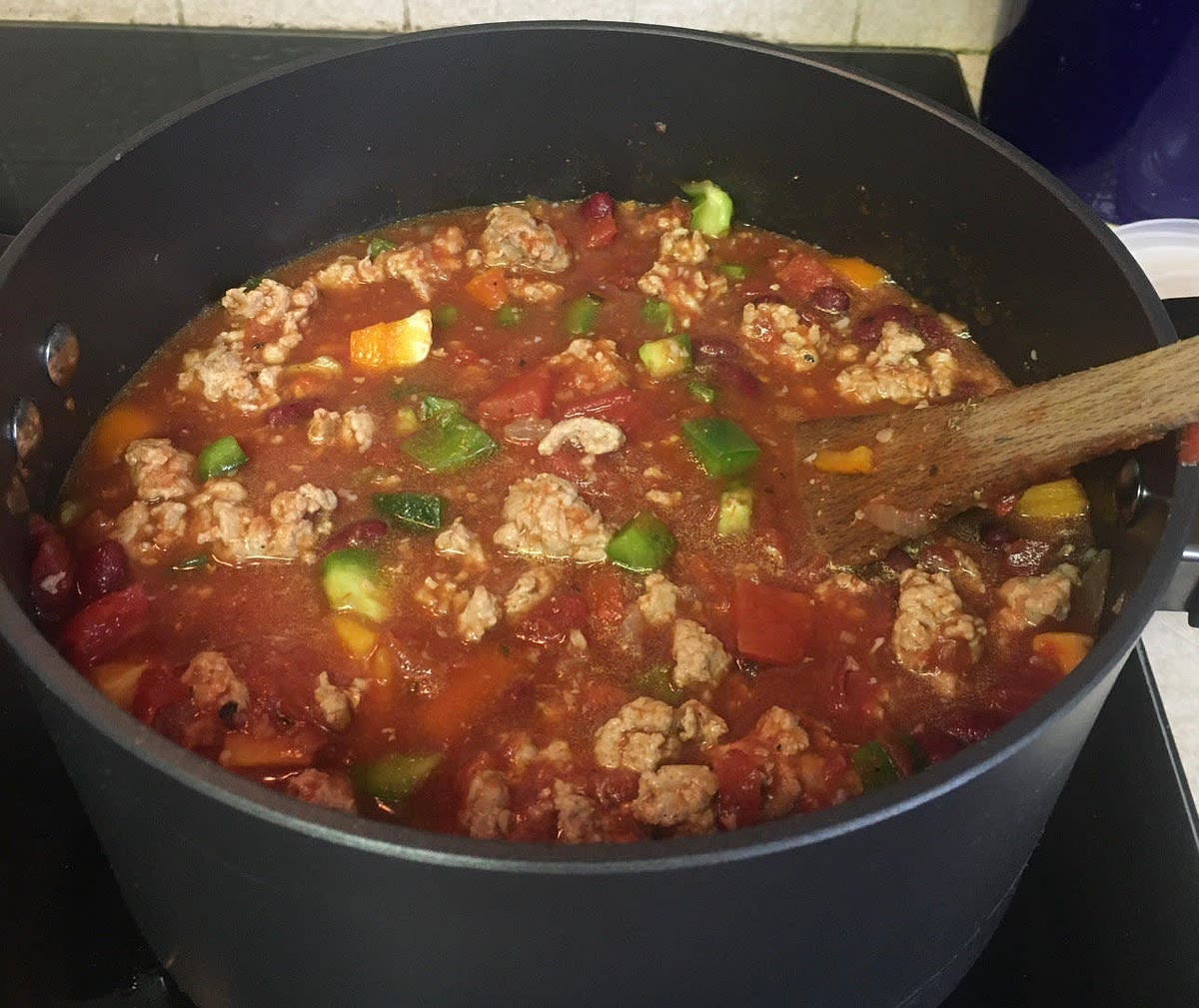 Bring to a simmer while stirring and simmer for 1 hour. (I give it a good stir about every 5 minutes during this hour. Make sure to get everything off the bottom of the pot every time you stir it.)